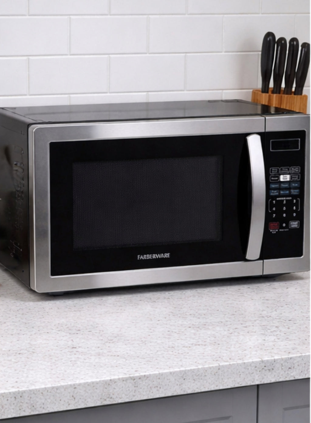 Farberware 1.1 Cubic Feet Countertop Microwave Oven w/ Child Lock